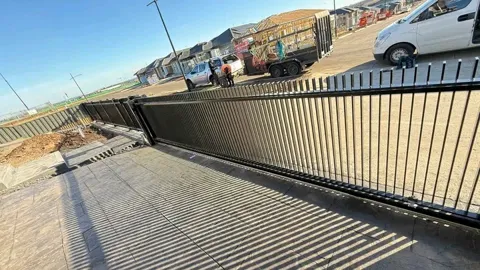 Black slat fence